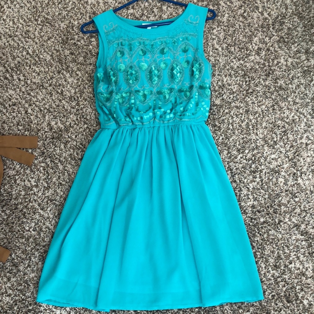 Turquoise dress with sequenced detailing